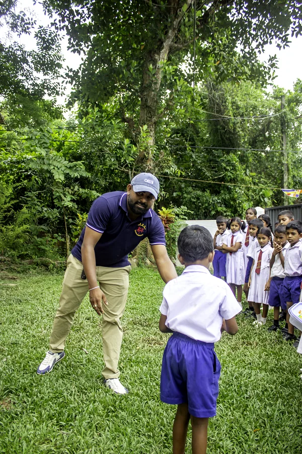 GCH young student receiving supplies school donation